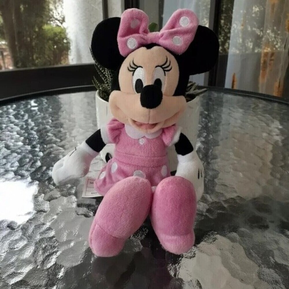 Disney minnie mouse plush- pink polka dots
Disney world Disneyland